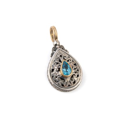 Mediterranean drop pendant in 18K Gold and Sterling silver with blue topaz